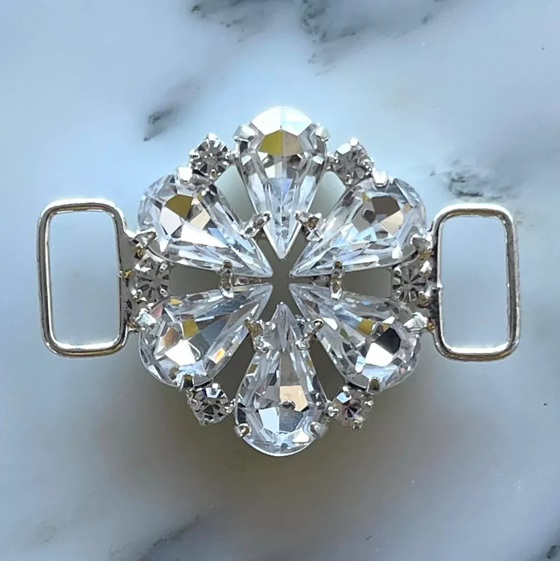 1 1/8″ Clear Rhinestone & Silver Round Starburst Metal Buckle